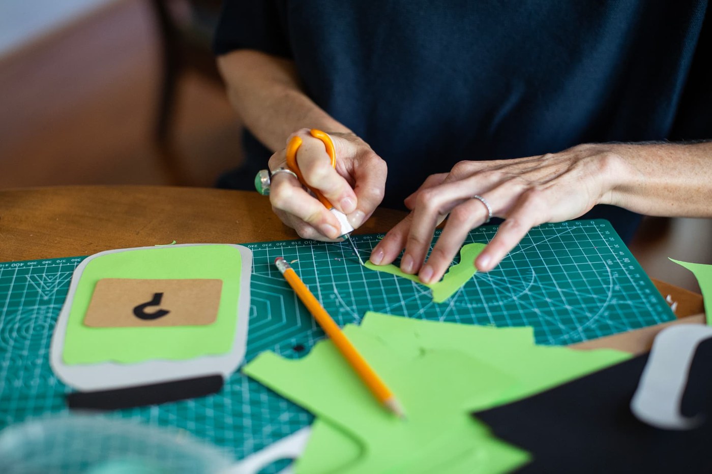 Susanna B. Klingenberg at work cutting paper in her studio