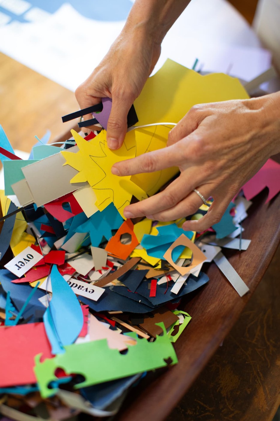 Susanna B. Klingenberg at work cutting paper in her studio